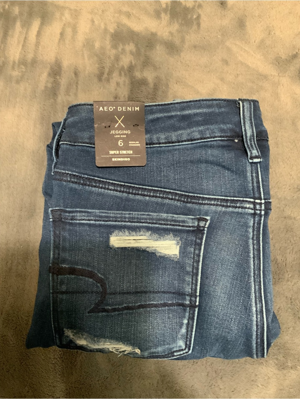 American Eagle Outfitters Indigo Blue Distressed Super Stretch Jeggings